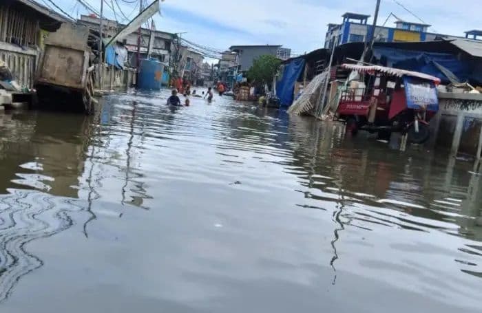 banjir_rob_hingga_26_meter_ancam_medan_utara_1016_september