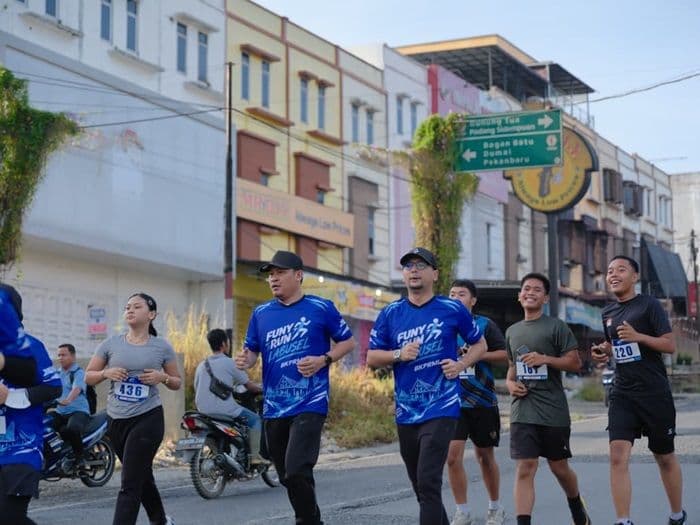bupati_labusel_lepas_fun_run_bkprmi_lanjut_senam_bersama_warga_di_kotapinang_