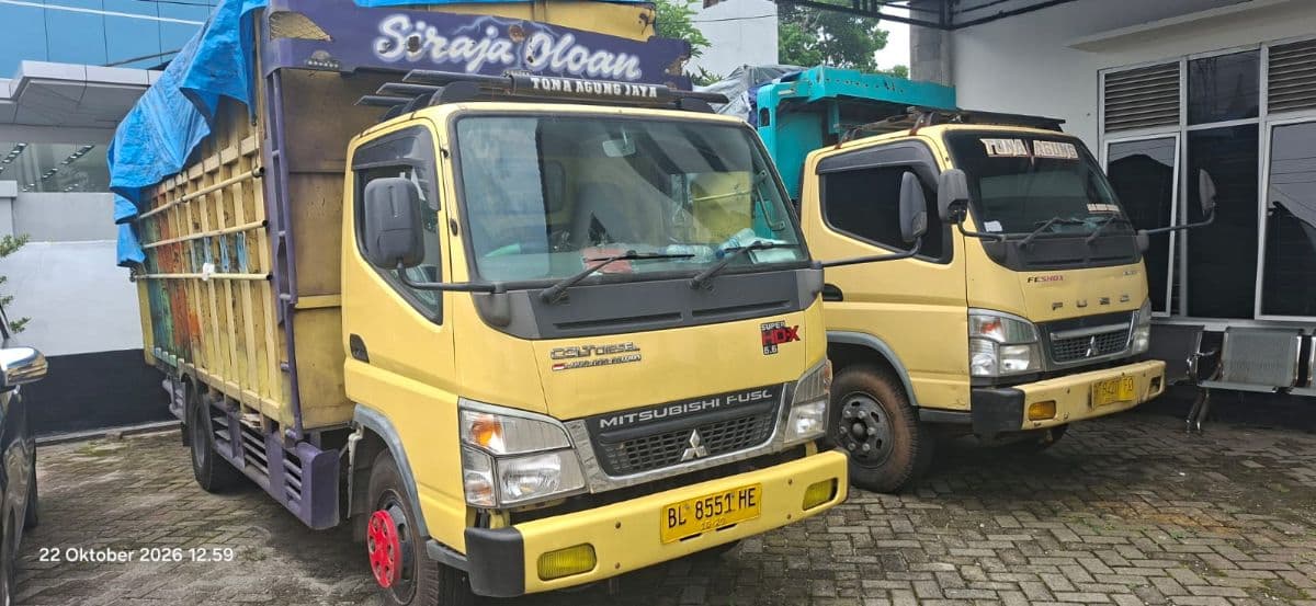 dua_truk_kayu_hasil_tangkapan_tni_dilimpahkan_ke_pn_sidikalang