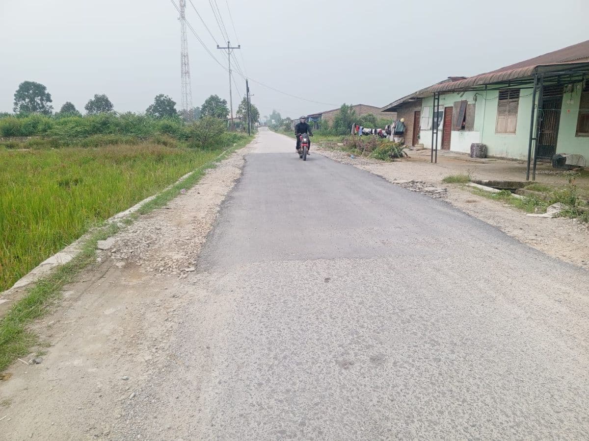 jalan_berlubang_di_patane_iv_porsea_ditambal_warga_harap_perbaikan_dilanjutkan