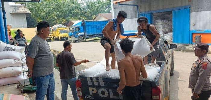 panen_perdana_polsek_air_joman_setor_23_ton_jagung_ke_bulog