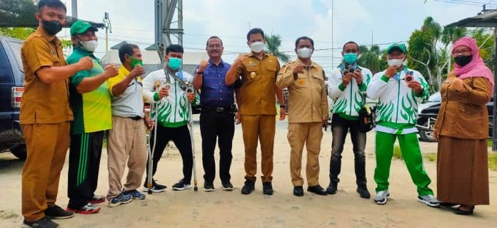 bupati_sergai_beri_bonus_atlet_npc_berprestasi_di_peparnas_papua