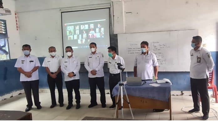 bupati_toba_tinjau_pelaksanaan_ptm_terbatas_smasmk
