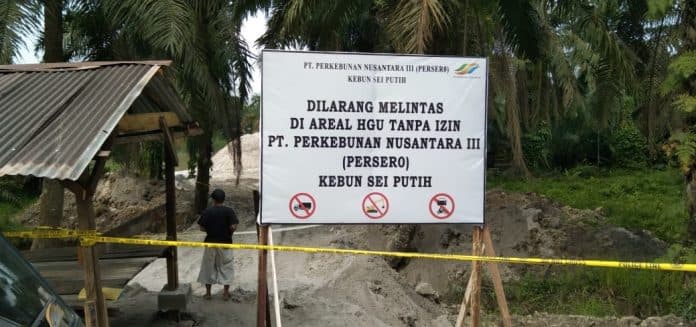 dipasang_police_line_ptpn3_larang_warga_melintas_di_lahan_hgu