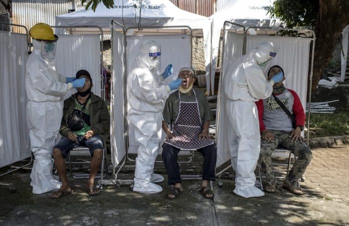 kasus_virus_corona_indonesia_mencapai_rekor_baru_tertinggi
