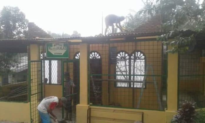 kmcc_galang_sumbang_semen_rehab_musholla_al_iklas