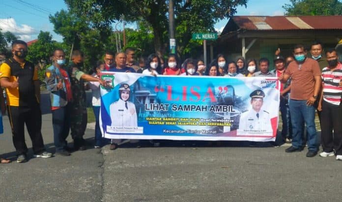 laksanakan_program_lisa_camat_siantar_marihat_ajak_warga_dan_okp_gotong_royong