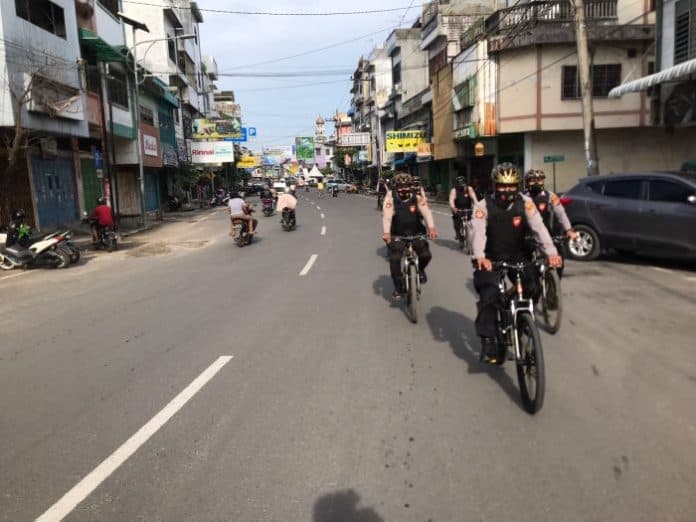polres_tebing_tinggi_patroli_bersepeda_deteksi_tingkat_kriminalitas
