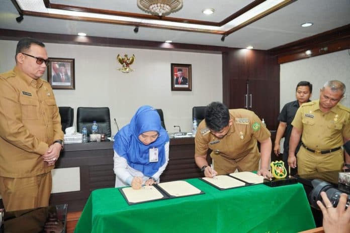 sah_mulai_1_desember_warga_kota_medan_dapat_gunakan_ktp_untuk_berobat