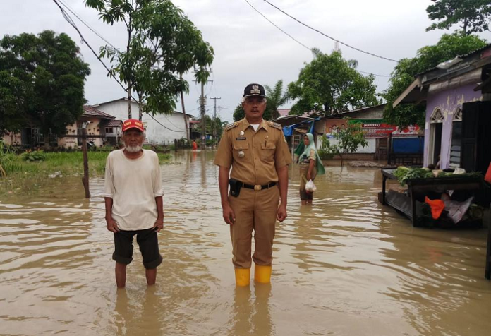tanggul_jebol_4235_rumah_di_sergai_terendam_banjir